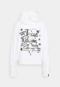 Biała krótka bluza z kapturem, z suwakiem, w oversize'owym kroju, z dużym czarnym brokatowym napisem z gwiazdkami. Miękka faktura materiału.