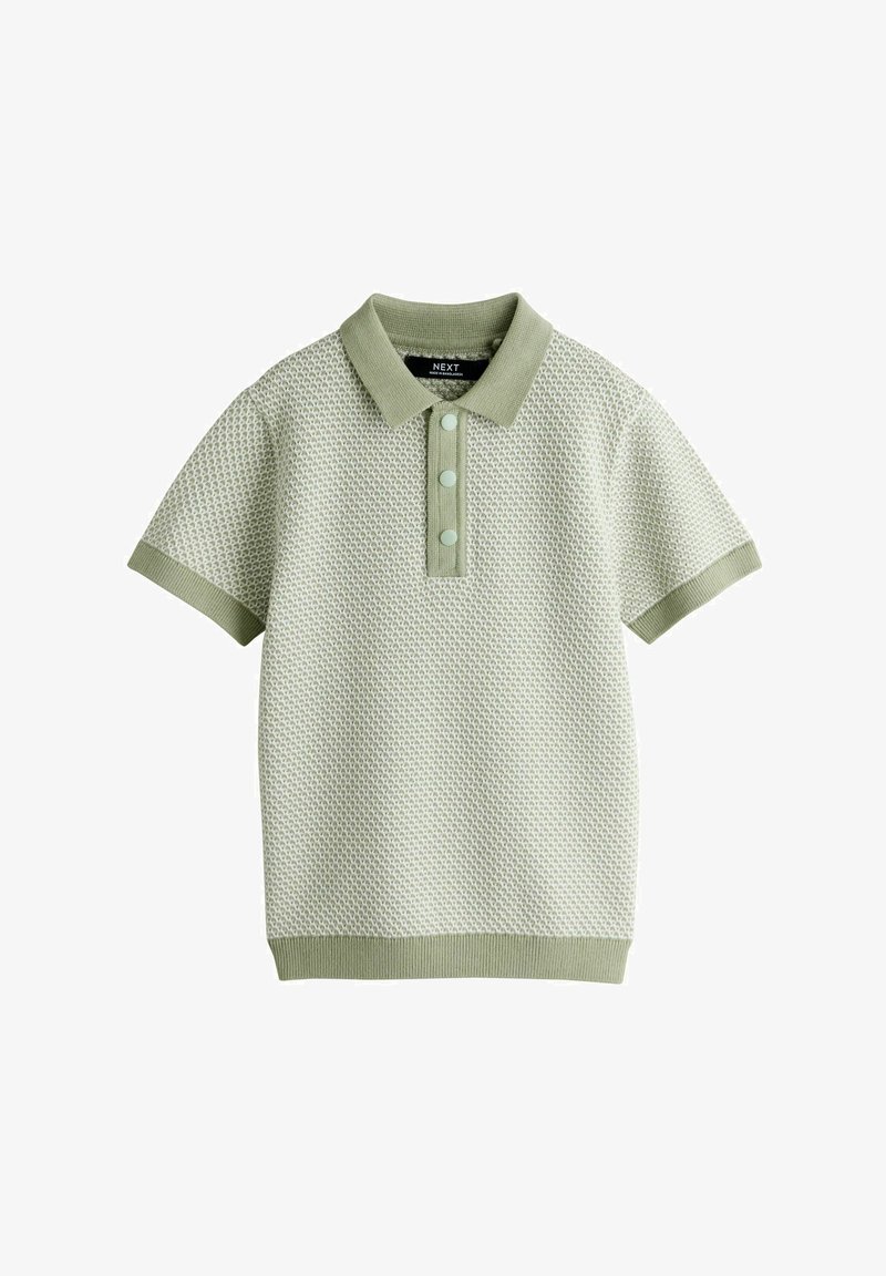Polo en maille vert clair à manches courtes avec motif texturé, trois boutons sur le devant, col, poignets et ourlet côtelés.