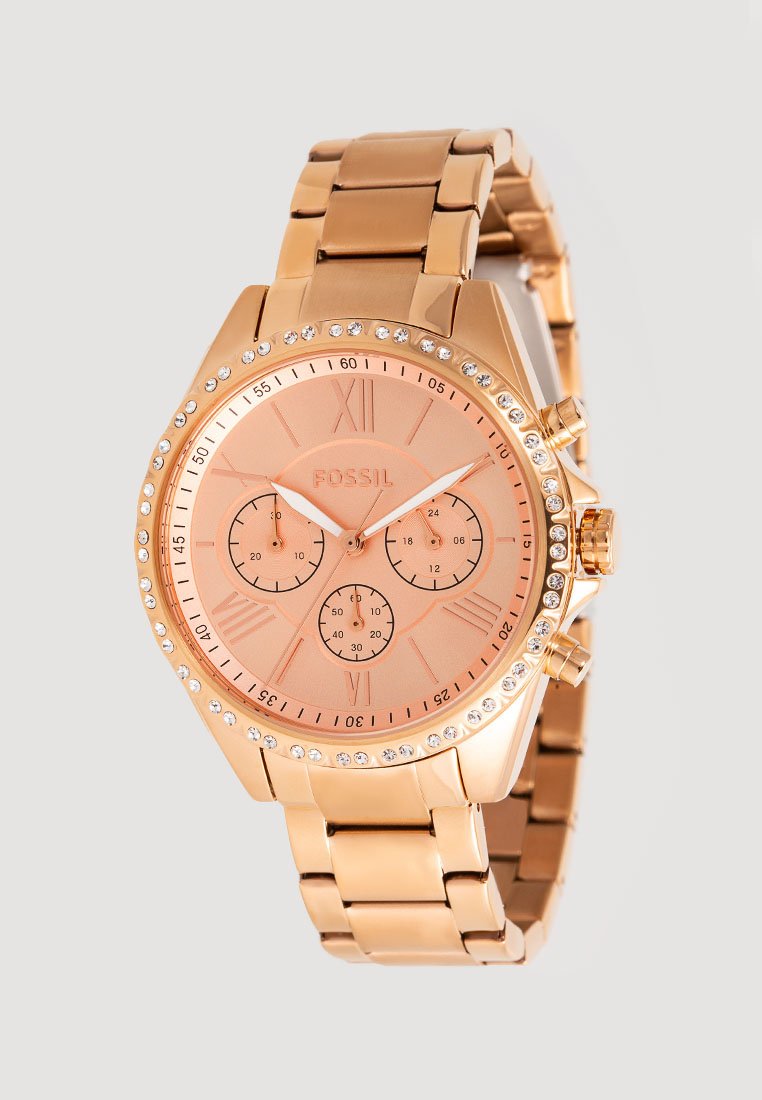 Roze gouden Fossil-horloge met een ronde wijzerplaat, kristalaccenten, drie sub-dials en een schakelarmband. Gladde metalen afwerking.