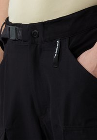 The North Face ANCOHUMA LOOSE PANT - Szabadtéri nadrágok - black