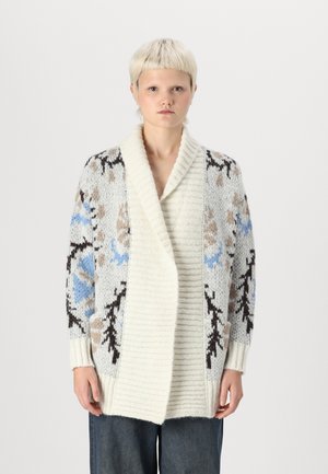 Πλεκτό κασκόλ σε κρεμ χρώμα με λουλουδάτα σχέδια σε μπλε, καφέ και μαύρο. Διαθέτει γιακά σάλι και ριμπ μανσέτες, κατασκευασμένο από υφή νήματος.