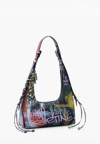 Hobo bag made of leather with a graffiti print in vibrant colors. Features a curved shape, zip closure, and braided side accents.