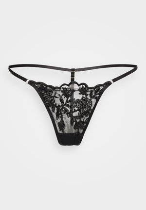 Μαύρο δαντελένιο thong με φλοράλ κεντήματα, διάφανο ύφασμα και σατέν λεπτομέρειες. Περιλαμβάνει ρυθμιζόμενες λωρίδες και σχέδιο με κυματιστές άκρες.