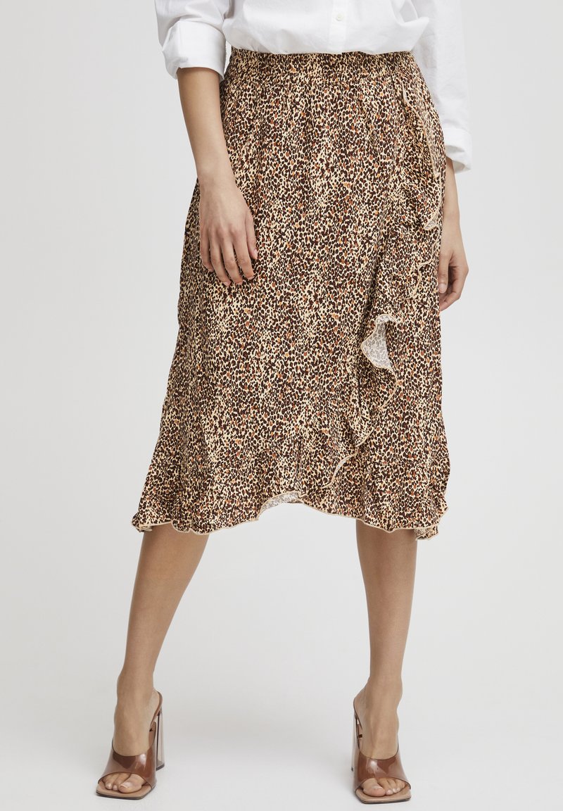 Bloemige midi-rok in bruin en crème met een gerimpelde zoom, voorzien van een gathered tailleband en een losse pasvorm voor comfort.