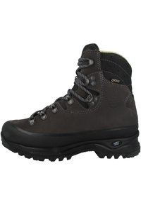 Brune skinnvandresko med høy ankel, metalløyer, gummitåhette og teksturert såle, med Gore-Tex-merke på siden.