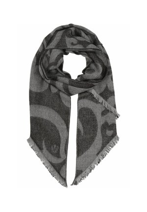 Écharpe douce grise et noire avec des motifs abstraits en spirale et des bords frangés, pliée en boucle sur fond blanc.