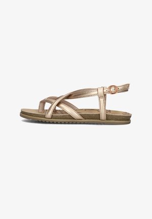 Metallic gold sandal with crisscross straps, adjustable buckle, and a textured rubber sole. Flat design for comfort with minimal detailing.