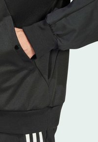 adidas Sportswear MATERIAL MIX TRACK - Trainingsjacke - black