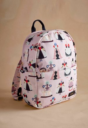 Backpack in pink fabric featuring a repeated pattern of stylized figures in dresses. Rounded shape with black accents and a top handle.