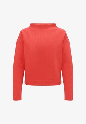 Maglione rigato corallo con collo alto, maniche ampie e vestibilità corta. Il materiale sembra morbido con una superficie testurizzata.