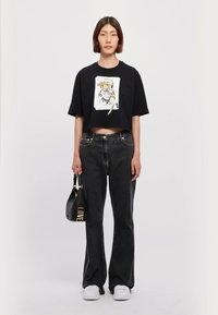 MOSCHINO Print T-shirt - fantasia nero