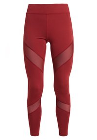 Leggings sportivi a vita alta, di colore rosso scuro, con pannelli in rete trasparente che avvolgono cosce e polpacci.