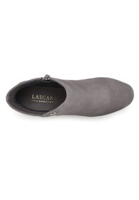 Gray faux suede ankle boot with a rounded toe, side zipper, and a smooth texture. Features branded insole with gold lettering.