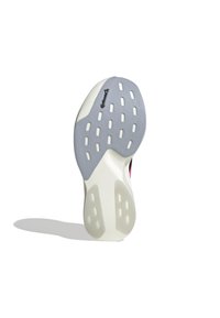 Shoe outsole with a gray rubber design featuring a textured surface and multiple drainage holes, outlined in white with a logo detail.