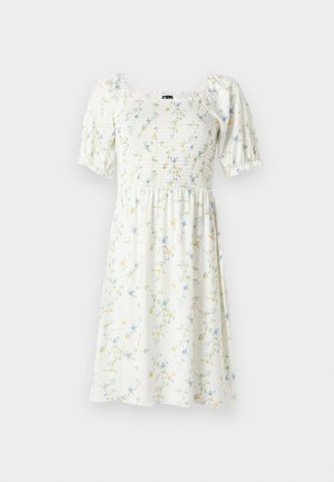 Floral-print dress with a square neckline, short puff sleeves, and smocked bodice. Made of lightweight, white fabric with blue and yellow flowers.