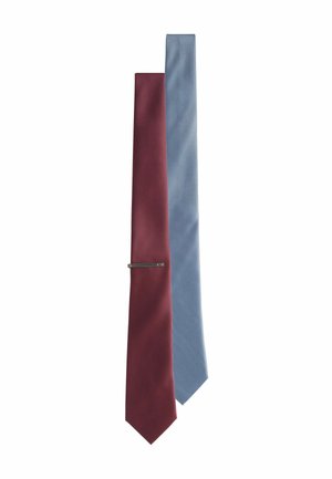 Two neckties displayed: one burgundy with a textured finish, and one light blue featuring a subtle pattern. Both have a slender design.