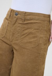 Kaffe WIDE - Trousers - toasted coconut