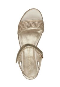 Infradito dorate con una fascia intrecciata; materiale superiore liscio, design con punta aperta e cinturino alla caviglia con fibbia regolabile. Suola arrotondata.