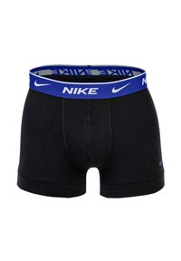 Schwarze Baumwoll-Boxershorts mit einem blauen elastischen Bund, der das Nike-Logo in Weiß zeigt. Sie verfügen über eine konturierte Tasche und genähte Säume.