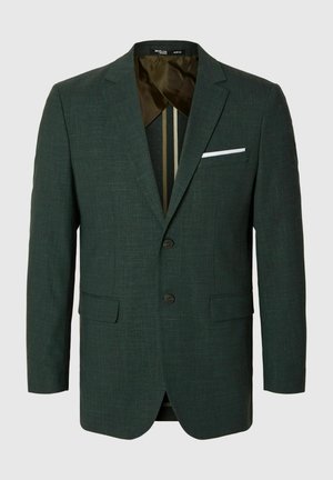 Dunkelgrün blazer aus strukturiertem Stoff, mit zwei Vorderknöpfen, Seitentaschen und einem weißen Taschentuch. Gefüttertes Innenleben mit gemusterten Details.