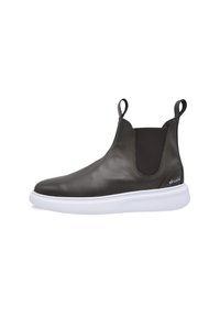 Botas de verano negras de cuero hasta los tobillos con paneles laterales elásticos, suela de goma blanca y tiradores para un fácil calzado. Textura suave y diseño minimalista.
