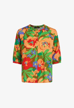 Camicia a maniche corte con bottoni, caratterizzata da un vivace motivo floreale e di foglie in arancione brillante, rosso, verde, blu e marrone.