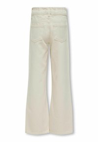 Pantalons en denim ivoire à jambe large avec une taille haute, deux poches arrière et des coutures décoratives sur la taille et les ourlets.