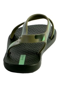 Green camo flip-flop with a textured black rubber sole. Features flat straps and a minimalistic design. Lightweight and suitable for casual wear.