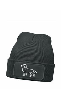 Black ribbed beanie with a fold-over cuff. Features a rectangular patch with a white outline of a dog. Made from soft, warm material.