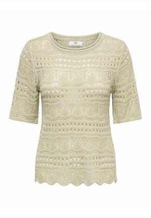 Top en maille beige à manches courtes avec encolure ronde, présentant des motifs crochetés ajourés délicats et un ourlet festonné.
