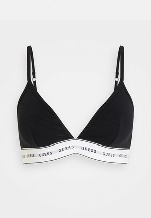 Sutiã triangular preto com alças ajustáveis, apresentando uma faixa branca com o texto repetido "GUESS" na parte inferior. Tecido macio e suave.