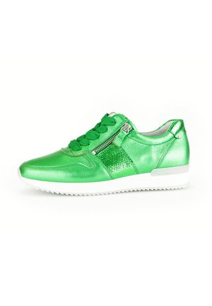 Green leather sneaker with a glossy finish, featuring a lace-up front, side zipper, textured accents, and a white rubber sole.