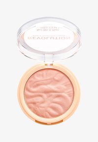 Blush compatto rotondo di un leggero pesca con superficie texturizzata. Coperchio trasparente con un anello esterno rosa. Adatto per la portabilità e facile accesso.