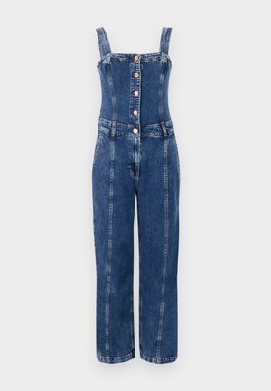 Salopetă din denim cu un corset ajustat, design cu pantaloni drepți, bretele ajustabile, nasturi frontali și o nuanță medie de albastru cu cusături în contrast.