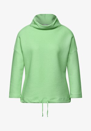 Zielony, teksturowany sweter z golfem i długimi rękawami. Posiada sznurek u dołu, który pozwala na regulację dopasowania.