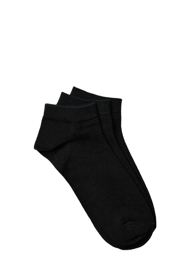 Calcetines de algodón negros hasta el tobillo con puños acanalados y cierre de dedo del pie sin costuras, que presentan una textura suave y un diseño minimalista.