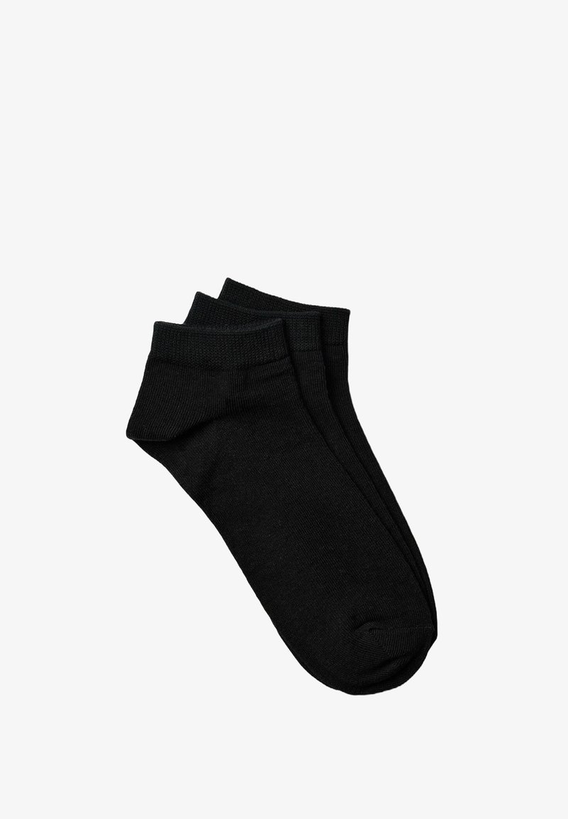 Sorte bomuldsankelsokker med ribbede manchetter og sømløs tålukning, der har en glat tekstur og minimalistisk design.