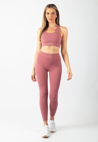 Carlheim Leggings - Byxor - berry