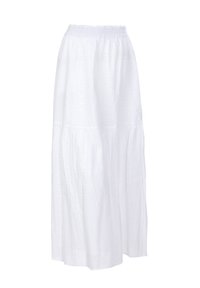 Biała bawełniana spódnica midi z elastycznym pasem, warstwowym krojem i wzorem z dziurkami. Lekka i przewiewna o gładkiej teksturze.
