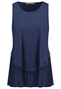 Haut sans manches bleu marine avec un col rond et un design en couches comprenant une couche supérieure lisse et un ourlet inférieur plissé.