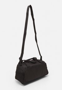 Puma FUNDAMENTALS BAG XS UNISEX - Αθλητική τσάντα - black
