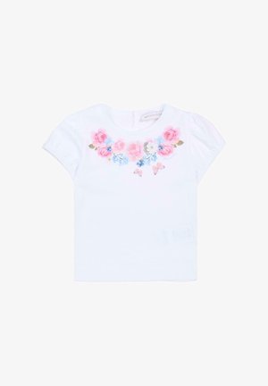 Biała koszulka z krótkim rękawem z kwiatowym wzorem różowych róż, niebieskich kwiatów i motyli. Z tyłu zamek błyskawiczny. Miękka tkanina.