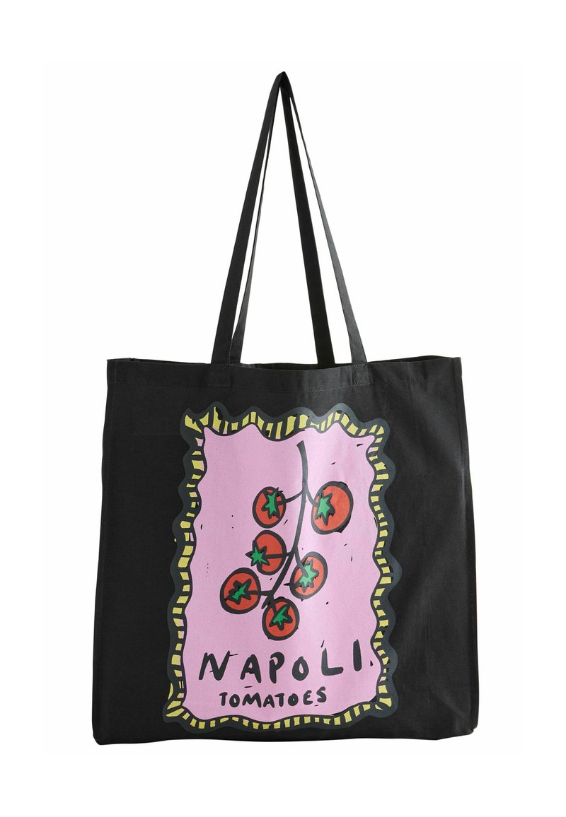 Black tote bag featuring a colorful illustration of tomatoes on a pink background, framed with a scalloped yellow border and text.