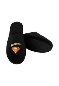 Black slipper with a soft texture, featuring a red and yellow Superman logo on the upper. Solid black sole with textured grip lines.