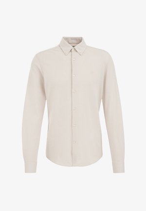 Svijetlo bež košulja dugih rukava s dugmadi i šiljastim ovratnikom, meke teksture i zaobljenim rubovima, koja na prsima ima suptilan logo.