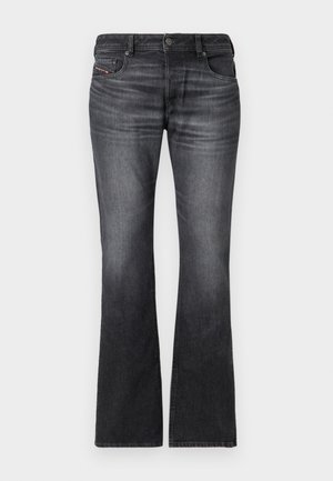 Jeans flare pretos feitos de denim, com um efeito desbotado, cinco bolsos e um fecho frontal com botão, com detalhes de costura contrastantes.