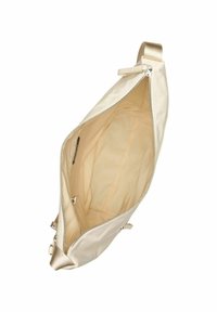 Sac en tissu beige avec une texture lisse, ouverture zippée et un intérieur doux et clair. Il dispose d'une seule sangle et d'un design minimaliste.