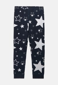 Marinefarbene Leggings mit weißen Sterne-Mustern, einschließlich kleinerer und größerer Sterne, aus weichem Stoff gefertigt, mit einer enganliegenden Passform und elastischem Bund.