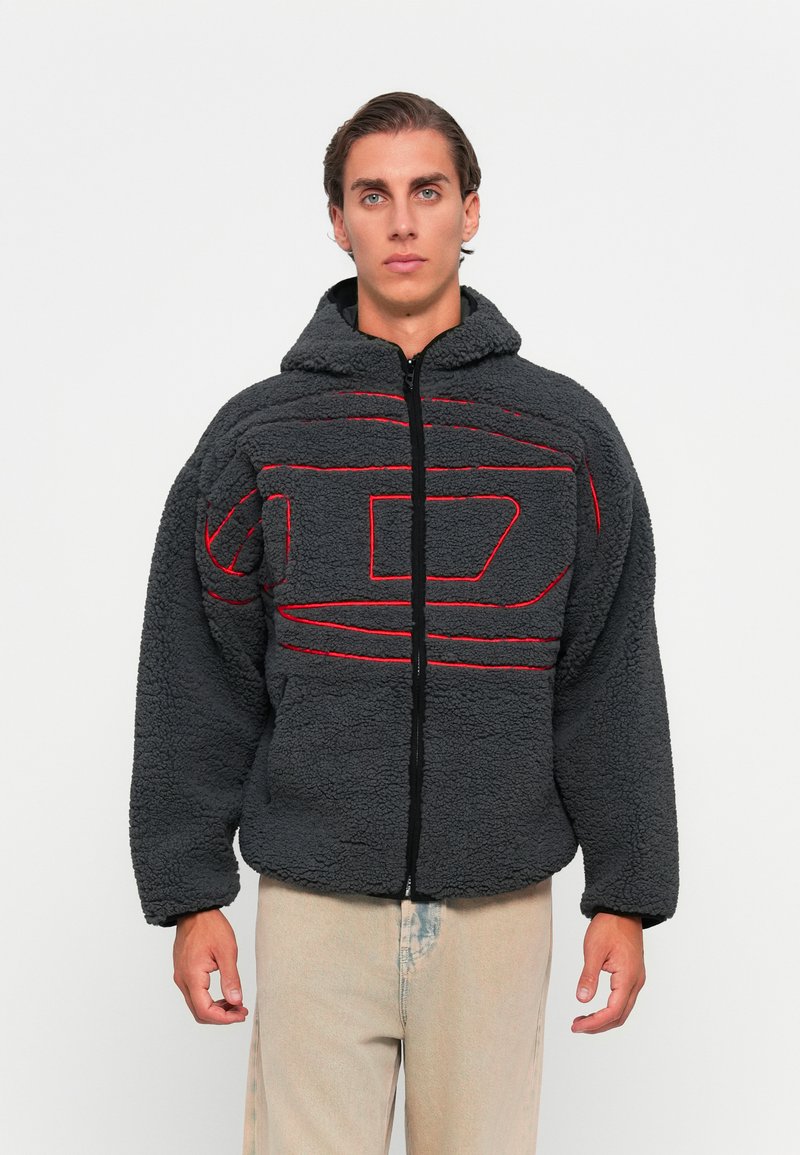 Gray fleece jacket with a hood, featuring red line patterns. Zippered front closure, wide sleeves, and a soft, textured material.