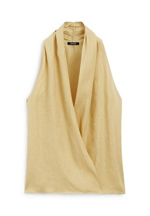 Tílková halenka z lehkého béžového lněného materiálu s překládaným designem a vysokým límcem. Hladká textura s minimálním šitím.